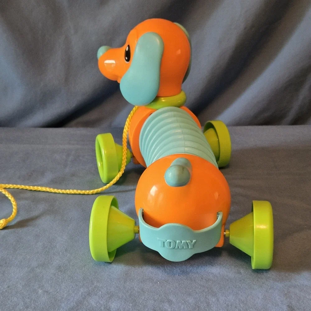 Tomy's  Marley The Musical Dog Plastic Pull Toy For Children 18M+